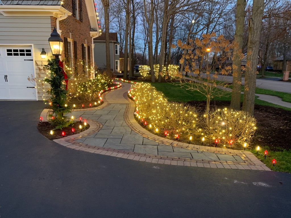 Stake path holiday lighting along a walkway in St Charles